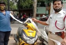 હેલમેટ ન પહેરતાં પોલીસે એક યુવકને પકડાવ્યું 2 મીટર લાંબું ચલણ